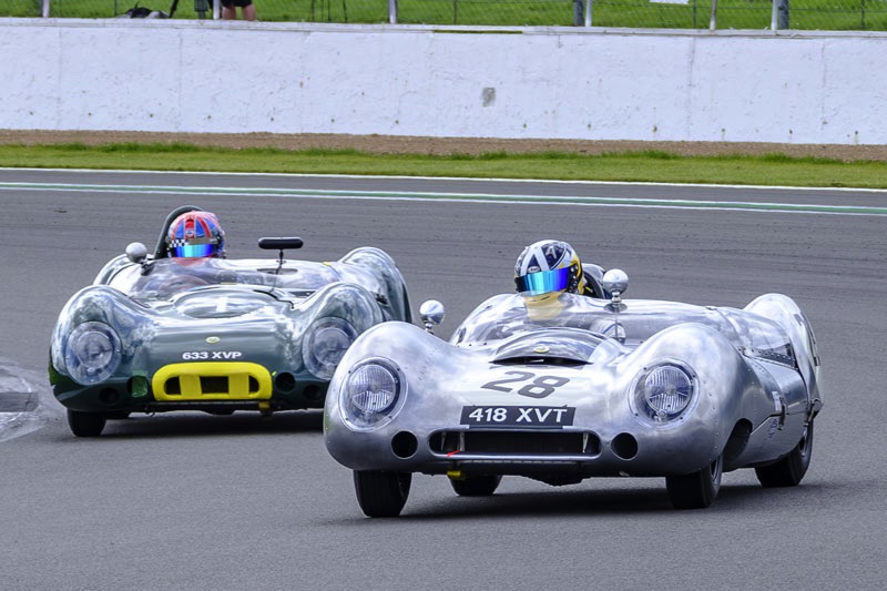 Pole sitter Andrew Kirkcaldy, Lotus 15 (#28) leads eventual race winner Olly Bryant in another Lotus 15 (#1) at the start of the RAC Woodcote & Stirling Moss Trophies race.