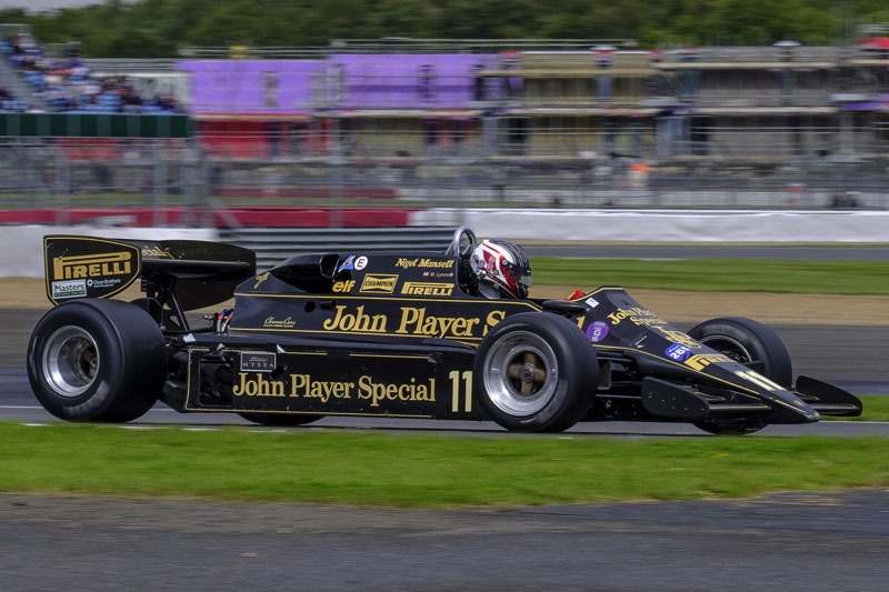 Michael Lyons in this Lotus 92 dominated the second Masters Historic F1 race after choosing to start on slicks with a half wet/half dry track.