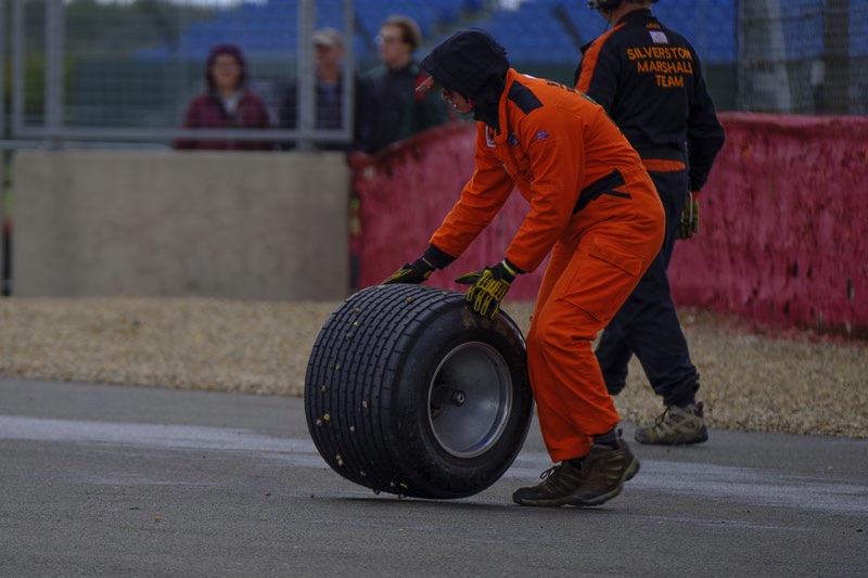 The wheel later being retrieved by a marshal.
