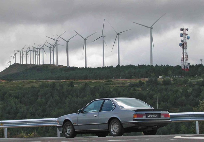 1986 BMW 635 CSiA with wind turbines in backgraound